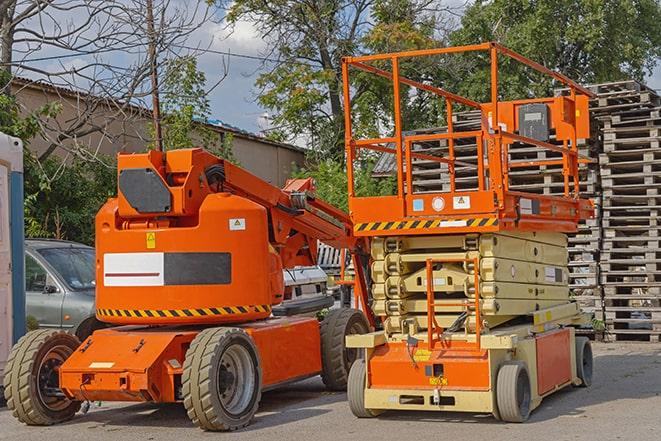 warehouse forklift in operation with stacked inventory in Greenacres